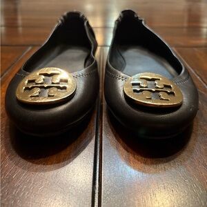 Tory Burch Black Flats with Gold Emblem